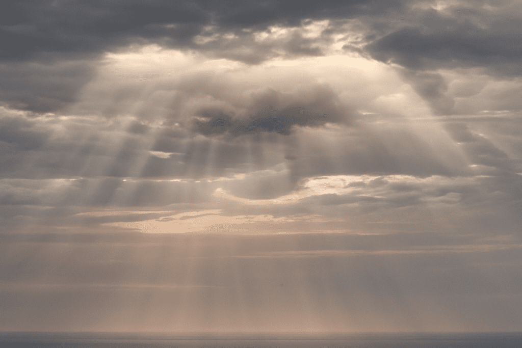 Dramatic Sunbeams Breaking Through Clouds